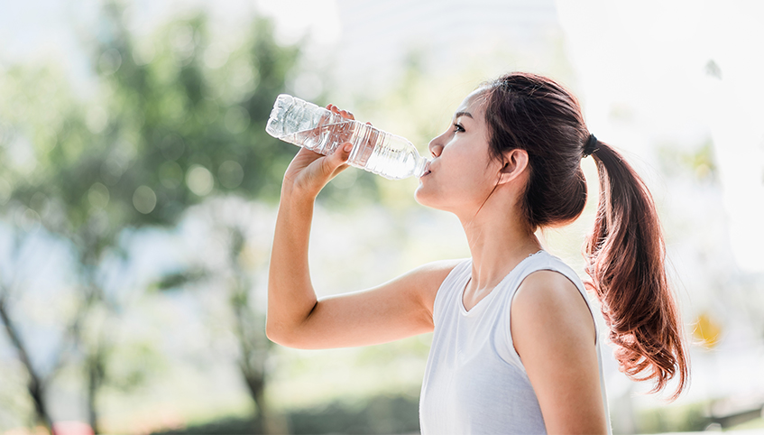 Athlete drinking water.